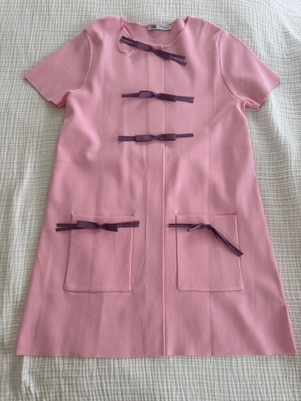 Zara women’s Pink Short-Sleeve Shift Dress with Purple Bow Accents